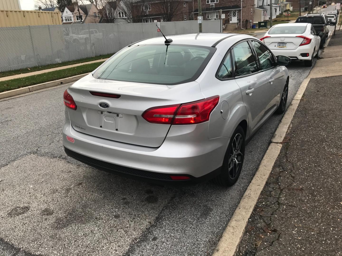 2018 Silver /Gray Ford Focus SE (1FADP3F24JL) with an 2.0 V4 engine, Automatic transmission, located at 577 Chester Pike, Prospect Park, PA, 19076, (610) 237-1015, 39.886154, -75.302338 - Photo#4